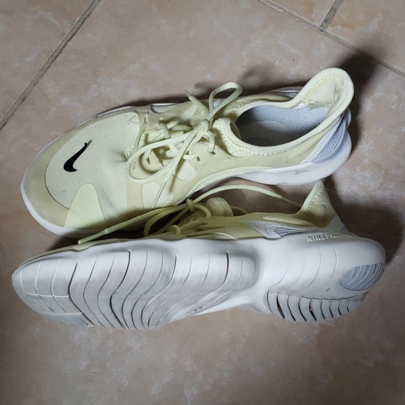 Nike Shoes - Nike free 5.0 woman shoes size 6.5 pale yellow